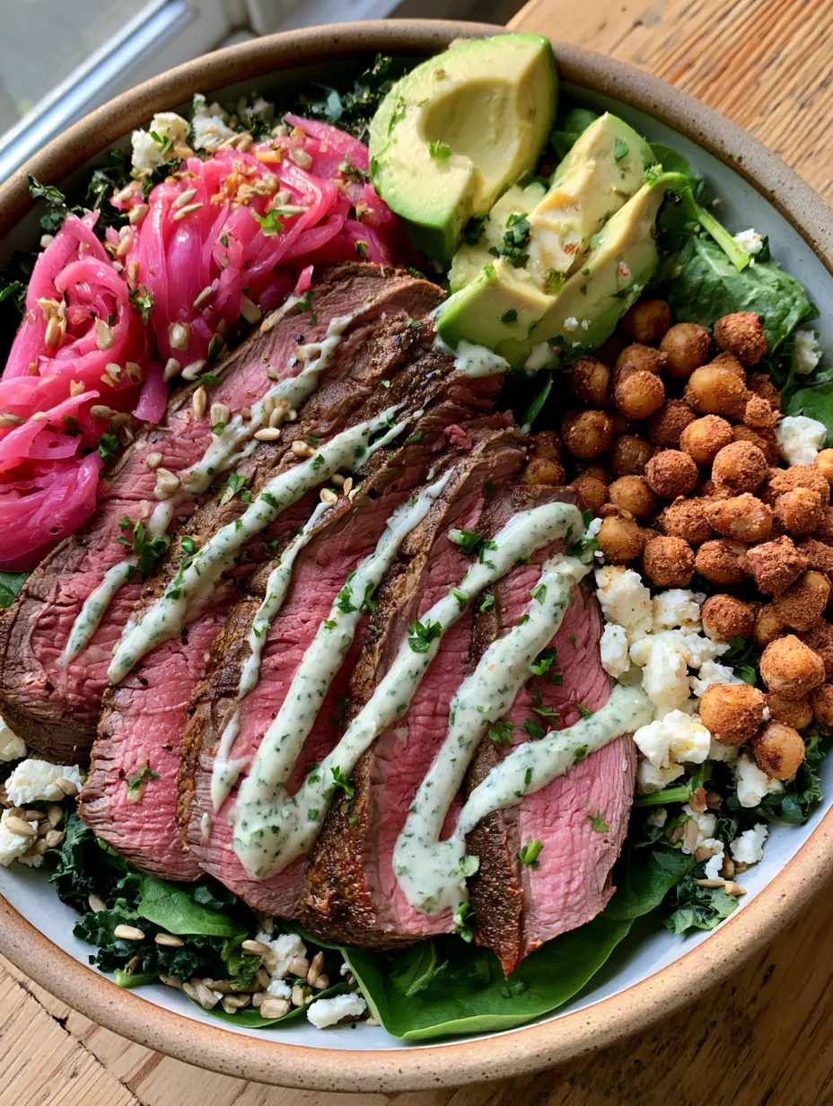 Dinner salad recipes for Steak Lovers: The Ultimate High-Protein Power Bowl 3 Top-down view of a gourmet steak salad with zigzag dressing and chickpeas, highlighting dinner salad recipes.